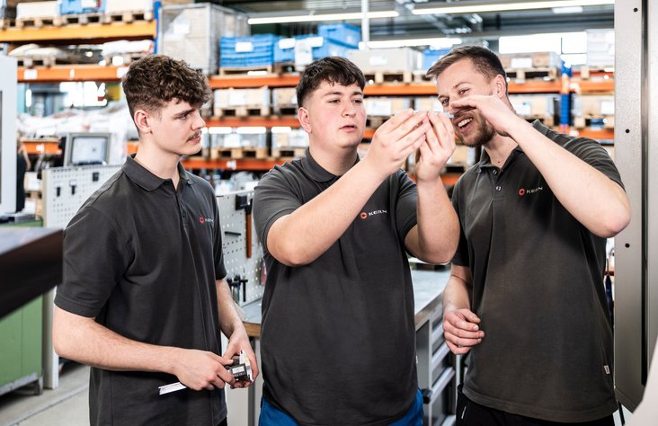 Three trainees in the quality inspection department at Kern Motion Technology