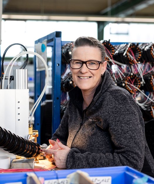 Employee in the coil winding department at Kern Motion Technology